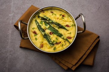 Dahi Bhindi or Okra in Yogurt Gravy, served in a bowl or karahi, selective focus