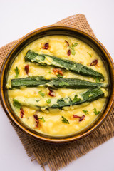 Dahi Bhindi or Okra in Yogurt Gravy, served in a bowl or karahi, selective focus