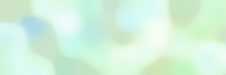 blurred horizontal background with tea green, light cyan and honeydew colors and free text space