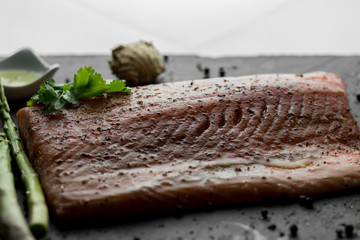 Salmon with asparagus olive oil and herbs