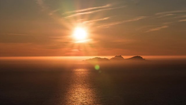 Timelapse of sunset over the sea behind Blasket Islands in Kerry Ireland