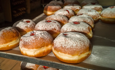 Festive appetizing donuts are sweet food attribute for Hanukkah Holiday