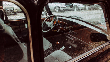 Vintage car interior through window