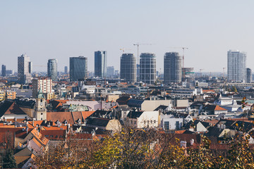Obraz premium Bratislava city view with historical center and modern business district construction on the background
