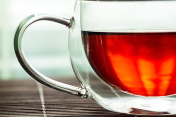 Cup of hot strong tea close