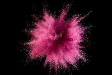 Colored powder explosion. Abstract closeup dust on backdrop. Colorful explode. Paint holi