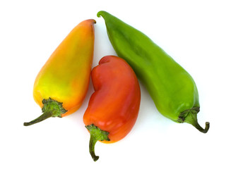 Red and yellow peppers on a white background