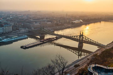 Sunrise view in Budapest, Danube river and Liberty bridge lit by the morning sun