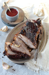 Baked meat with cranberry sauce