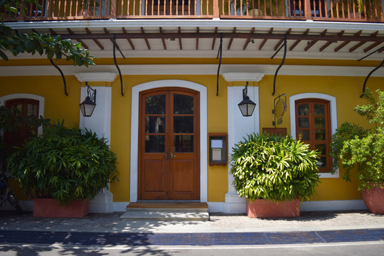 Yellow Bright Building With Lanterns In The French Colony In Pondicherry, Tamil Nadu, India.