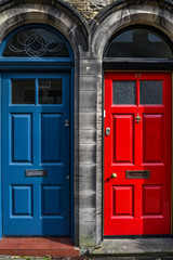 Fototapeta na wymiar Traditional home door in England in red and blue.