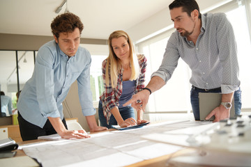 Fototapeta premium Team of architects working on project