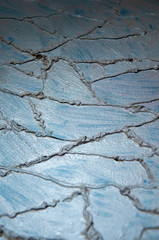 Modern art abstract pattern of curved lines oil paints on gray metallic background