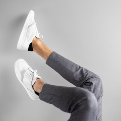 white shoes with grey pants