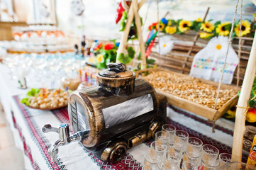 Dessert table of cocktails beverages on wedding reception.