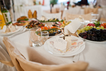 Dessert table of delicious food on wedding reception.