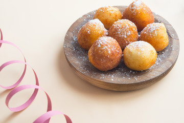 Carnival italian fritters on brown background