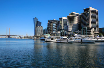 Fototapeta na wymiar Docklands accommodation precinct in Melbourne Australia with the Bolte Bridge in the background.