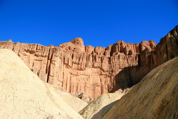 Fototapeta premium Red Cathedral Canyon Ridge golden sunset in Death Valley National Park