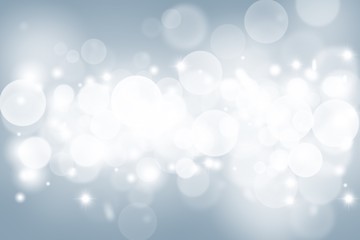 Blue gray abstract background. white bokeh and snowflakes blurred beautiful shiny lights. use for Merry Christmas /happy new year wallpaper backdrop and your product.