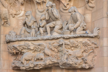 Detail of the external facade of the Sagrada Familia in Barcelona in Spain. The Cathedral is an important work of art designed by the architect Antoni Gaudi.