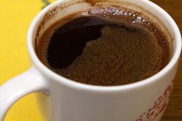 Tried cup of traditional coffee, also known as Turkish or Greek coffee