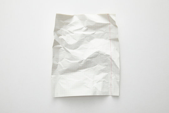 top view of empty crumpled paper on white background