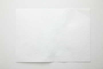 top view of empty paper on white background