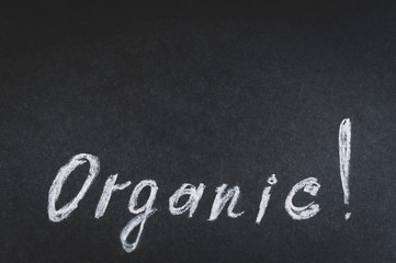 Fototapeta na wymiar word organic on the blackboard, copy space on top, mock up