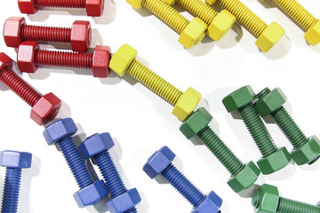  background of multi-colored bolts with nuts