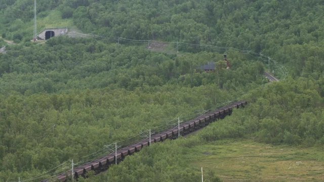 Time Lapse Of The Iron Ore Line In Northern Sweden. Natural Resources, Iron Industry, Economy Concept. Location: Bjorkliden, Sweden, Scandinavia. July Of 2019. 