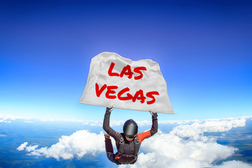 Las Vegas. Flag in skydiving. People in free fall.Teampleat skydiver. Extreme sport.