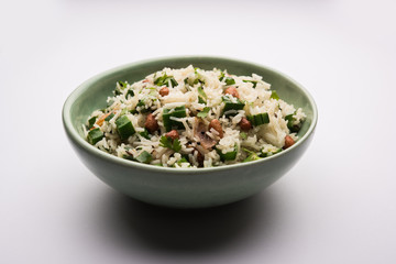 Okra or Bhindi rice also known as Vendakkai Sadam, served in a bowl, selective focus