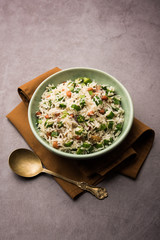 Okra or Bhindi rice also known as Vendakkai Sadam, served in a bowl, selective focus