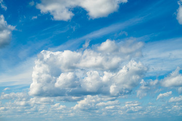 blue sky is covered by white clouds