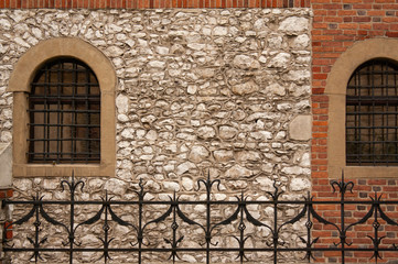 fragment of an old wall with two windows