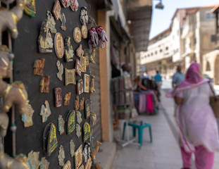 street view in an alley of Amman with artefacts and mementos on display