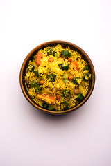 Okra or Bhindi rice also known as Vendakkai Sadam, served in a bowl, selective focus