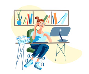 Young woman freelancer working at computer at home