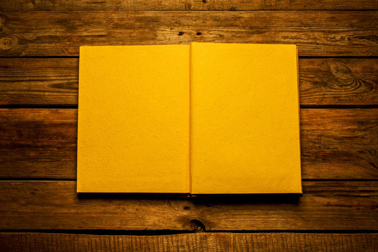 Old Blank Open Book On Wooden Background From Above