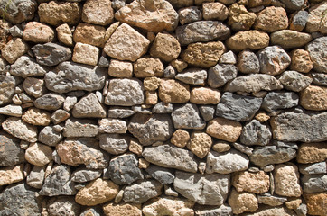 Colorful ancient stone wall  close up