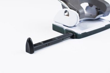 Paper punching tool isolated on white background.Copy space