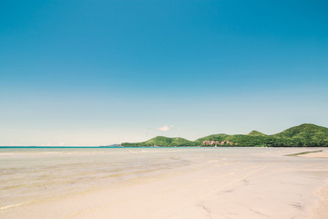 Beach, sea, sky and mountains