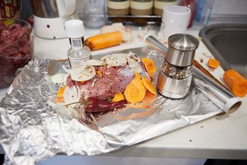 process of cooking beef in the kitchen