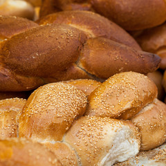 white bread and challah for saturday meal fresh and tasty pastries for the table
