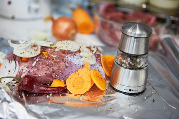 process of cooking beef in the kitchen