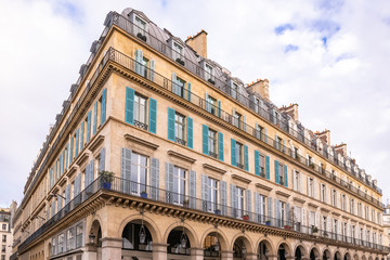 Fototapeta na wymiar Paris, typical building, parisian facade and windows rue de Rivoli 