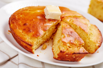 Cornbread on a white plate, top view