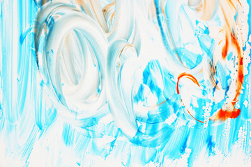 Abstract strokes of multicolored gouache on white paper for backgrounds