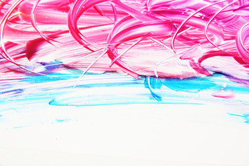 Abstract strokes of multicolored gouache on white paper for backgrounds